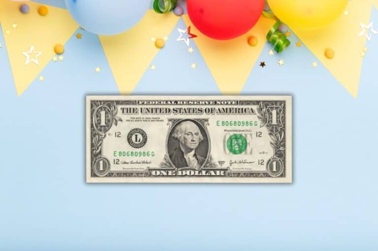 $1 dollar bill on colorful party background